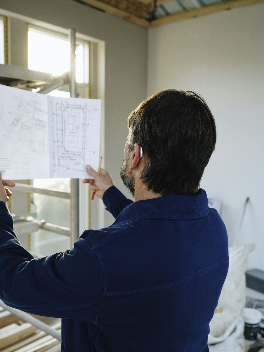 Engineer reviewing electrical drawings